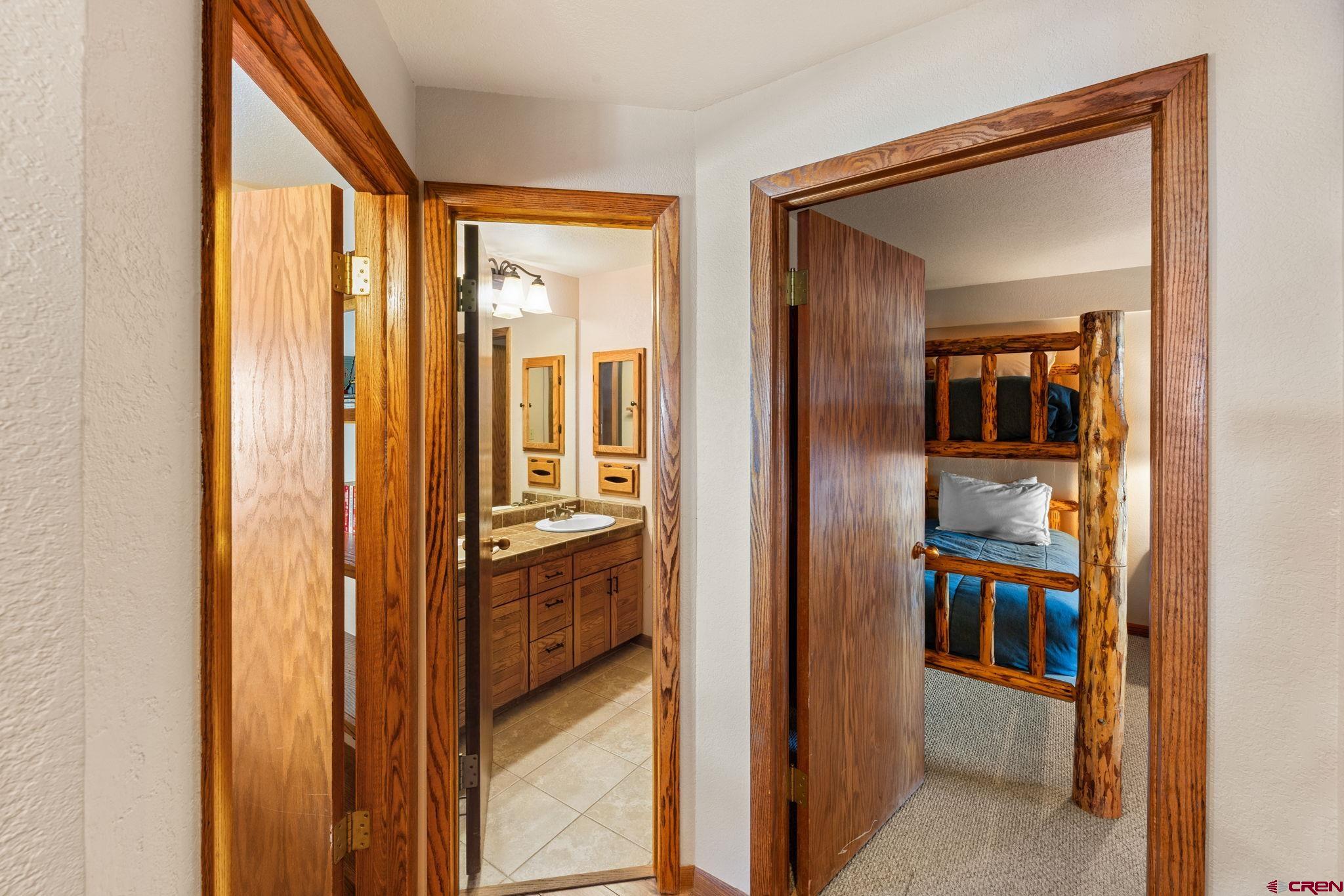 11 Snowmass Road, Unit 638 Crested Butte, CO 81225 - Photo 8 of 41 a view of a bathroom from a hallway