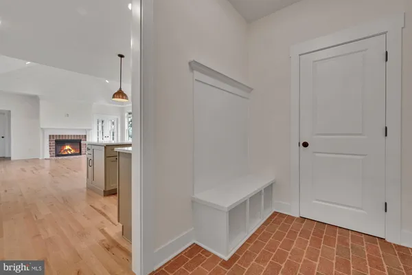 a view of a kitchen from the hallway