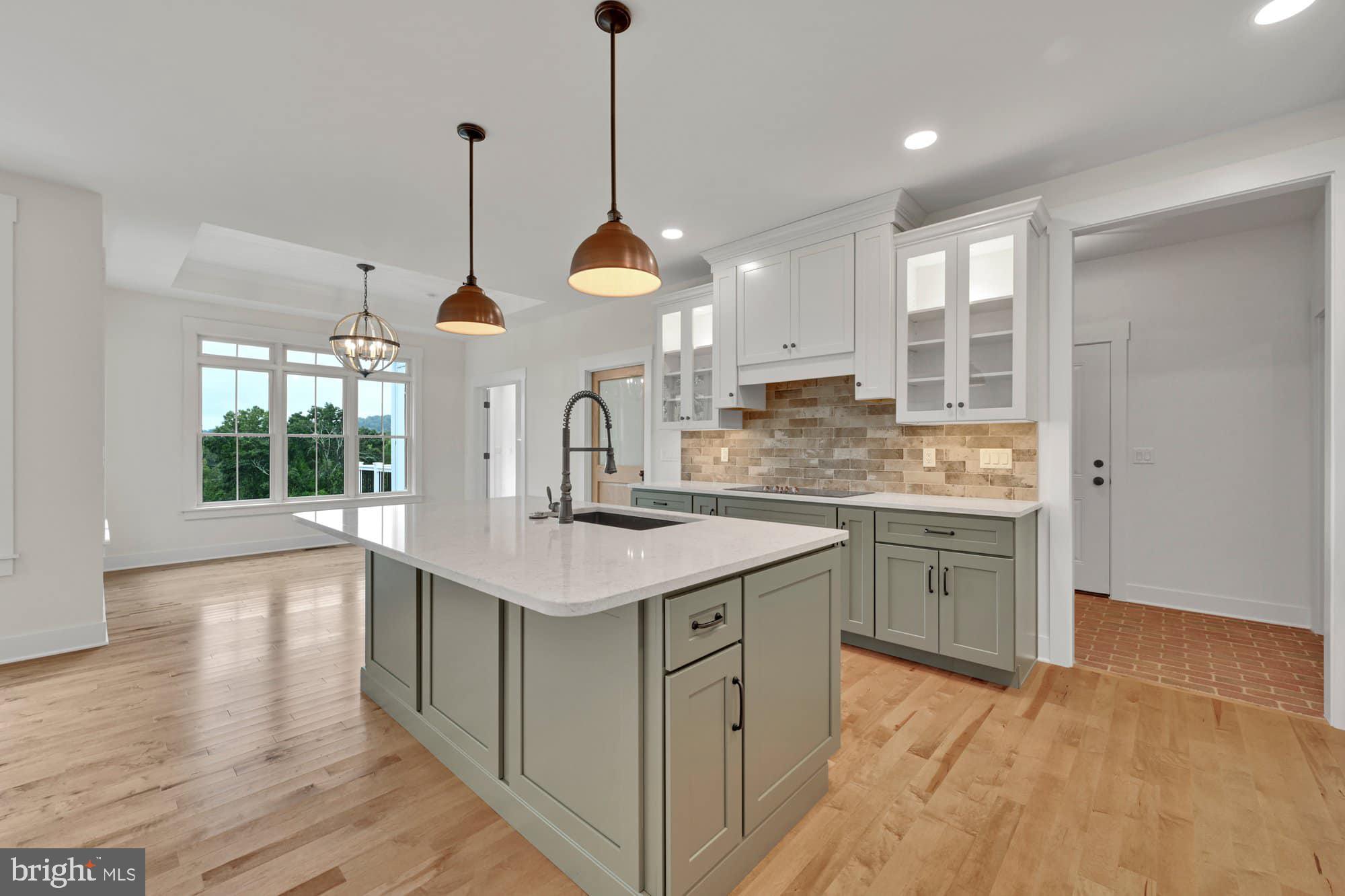 70 Long Lane Kirkwood, PA 17536 - Photo 6 of 25 a kitchen with a sink cabinets and window