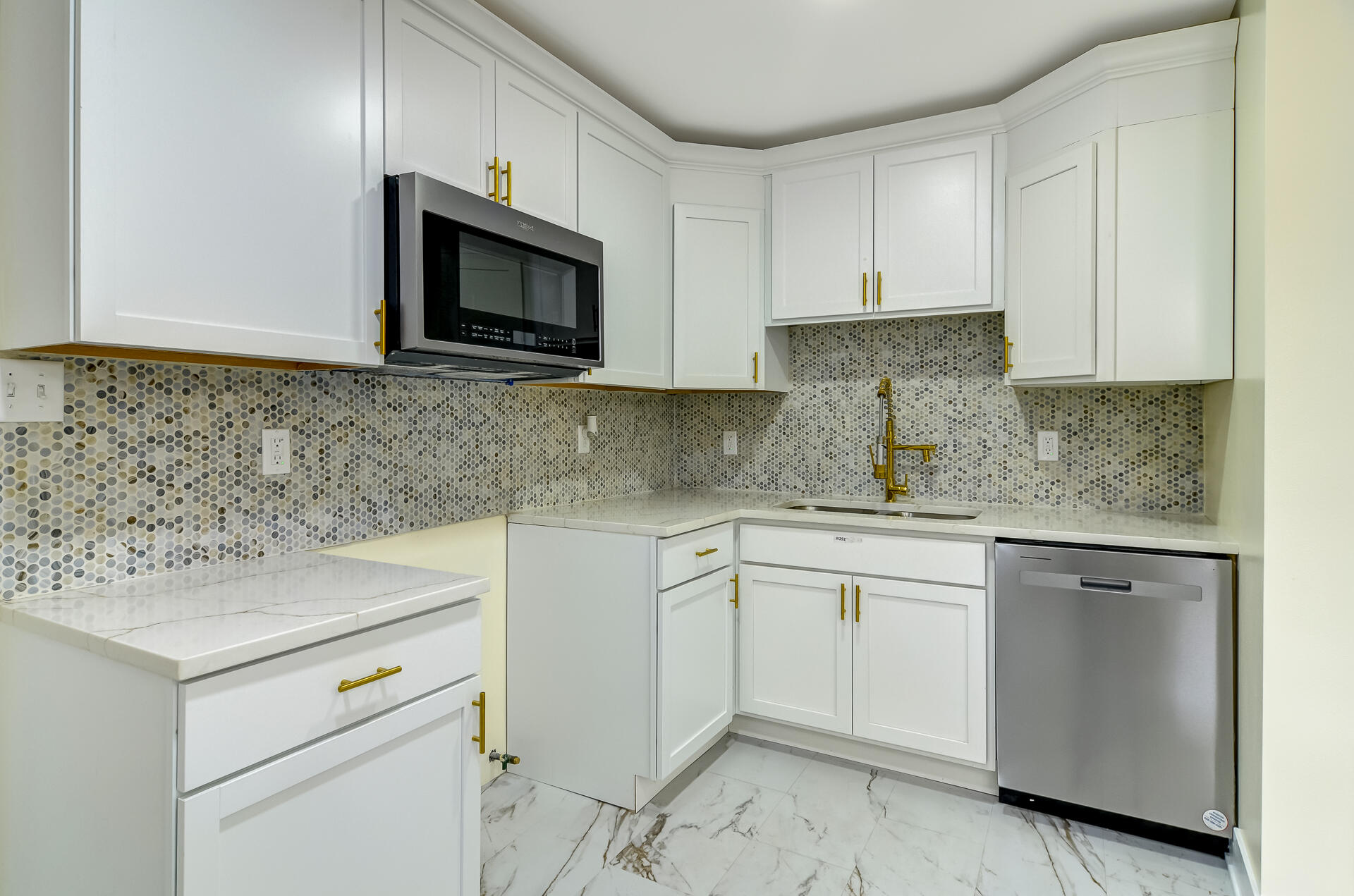 4381 Lincoln Street Gary, IN 46408 - Photo 11 of 24 a kitchen with cabinets appliances and a sink