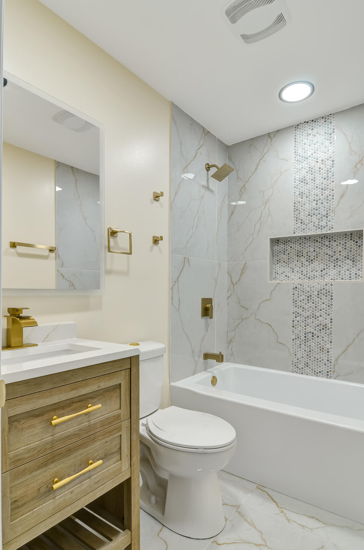 4381 Lincoln Street Gary, IN 46408 - Photo 17 of 24 a bathroom with a sink a toilet and a bathtub