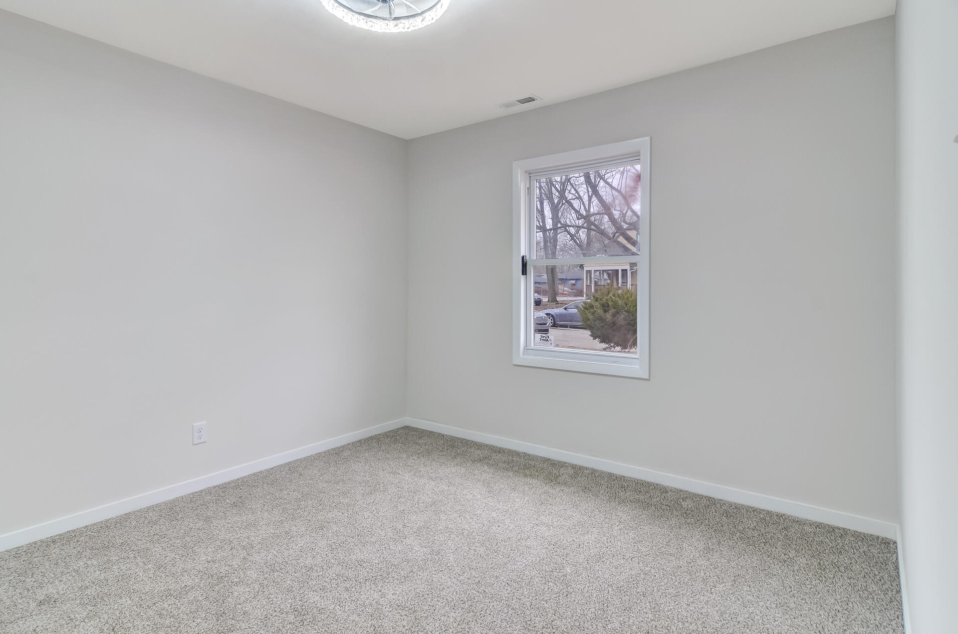 4381 Lincoln Street Gary, IN 46408 - Photo 19 of 24 an empty room with windows