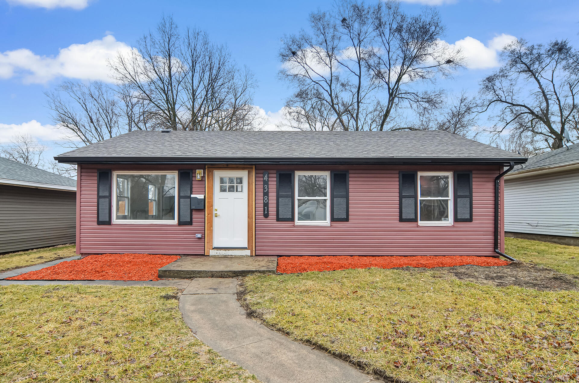 4381 Lincoln Street Gary, IN 46408 - Photo 22 of 24 a front view of a house with a yard