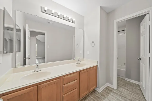 a view of a backyard of the house