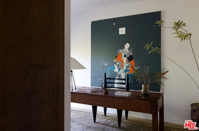 a view of a workspace with furniture