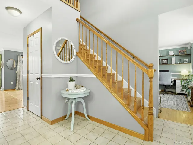 a bathroom with a sink a mirror and a shower