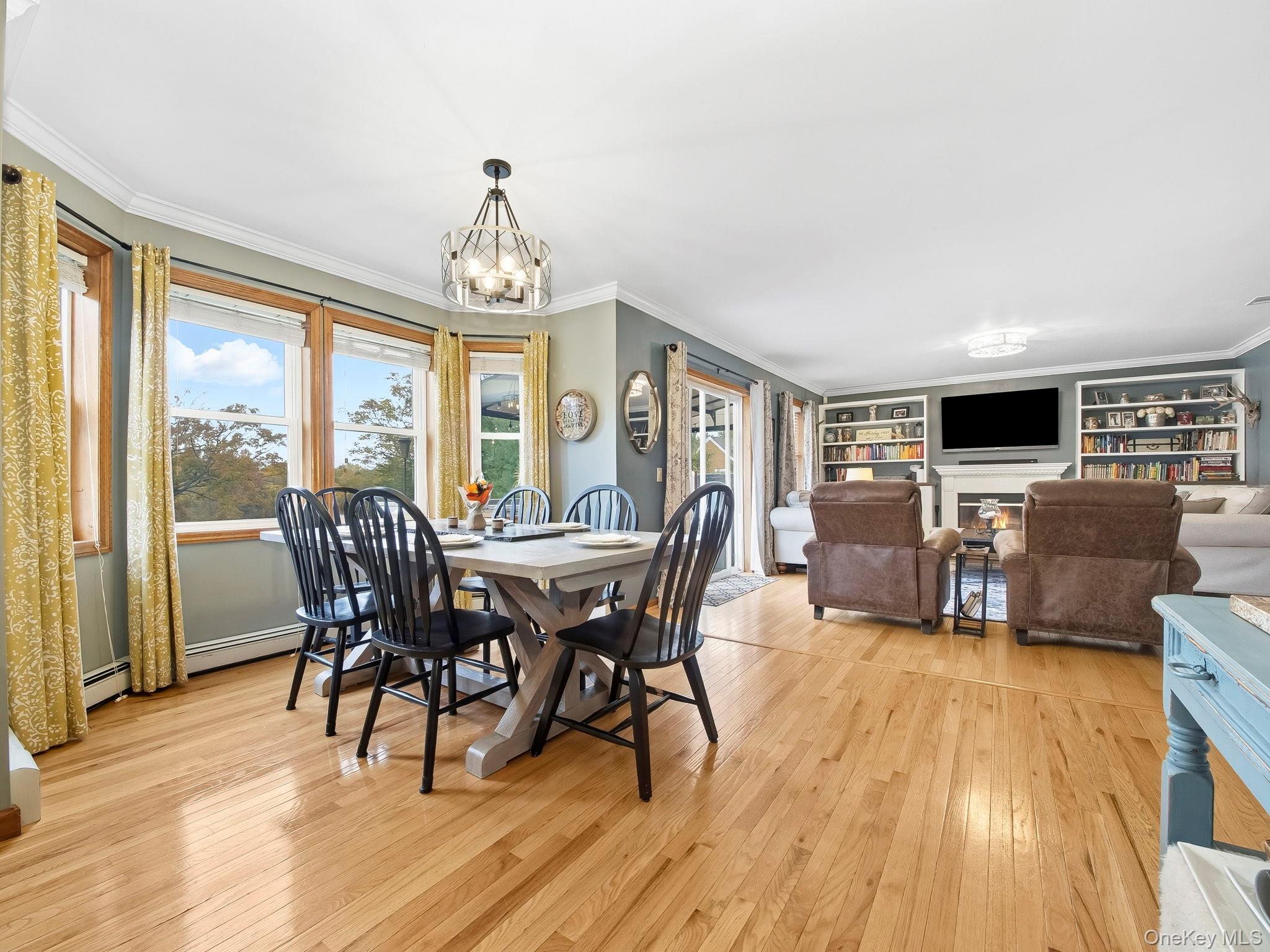 90 Reilly Road LaGrangeville, NY 12540 - Photo 25 of 50 a view of a dining room with furniture window and wooden floor
