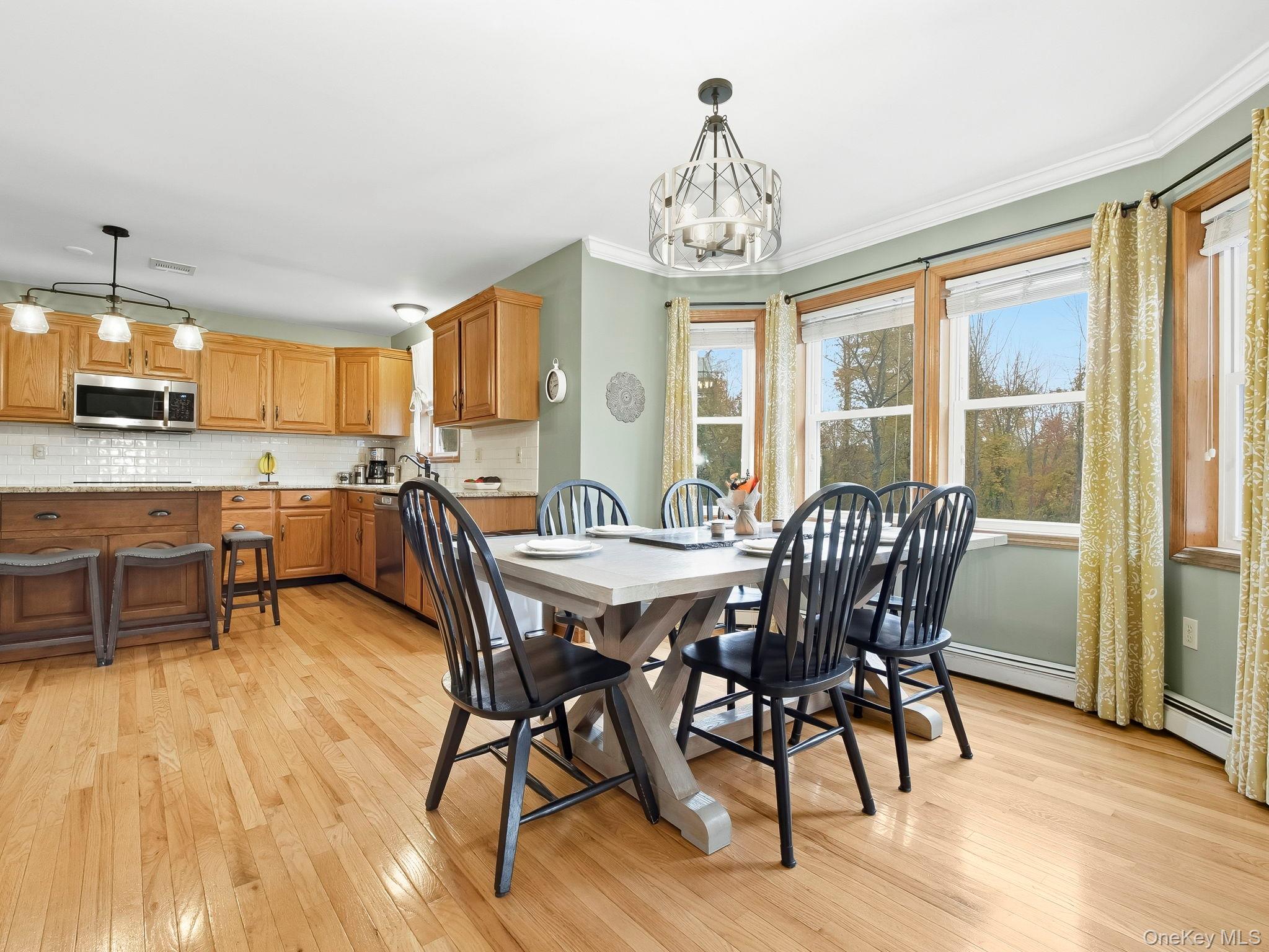 90 Reilly Road LaGrangeville, NY 12540 - Photo 28 of 50 a view of a dining room with furniture window and wooden floor