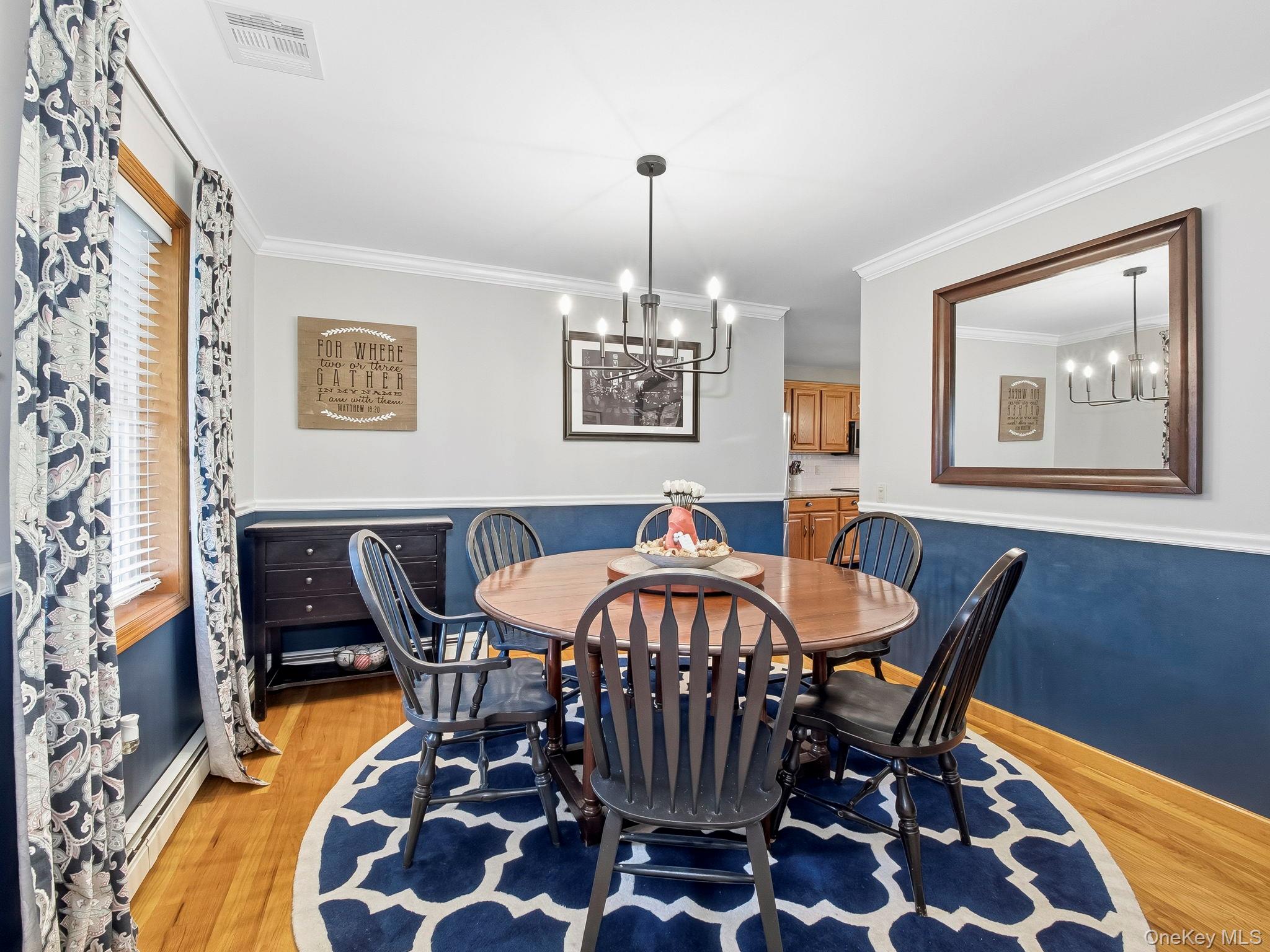 90 Reilly Road LaGrangeville, NY 12540 - Photo 34 of 50 a view of a dining room with furniture and chandelier