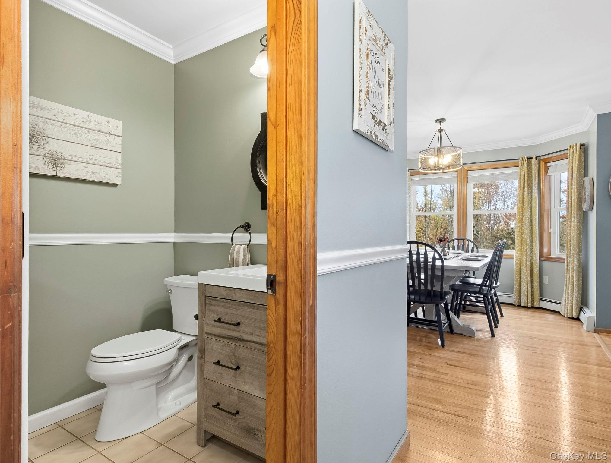90 Reilly Road LaGrangeville, NY 12540 - Photo 35 of 50 a bathroom with a toilet a sink and a mirror
