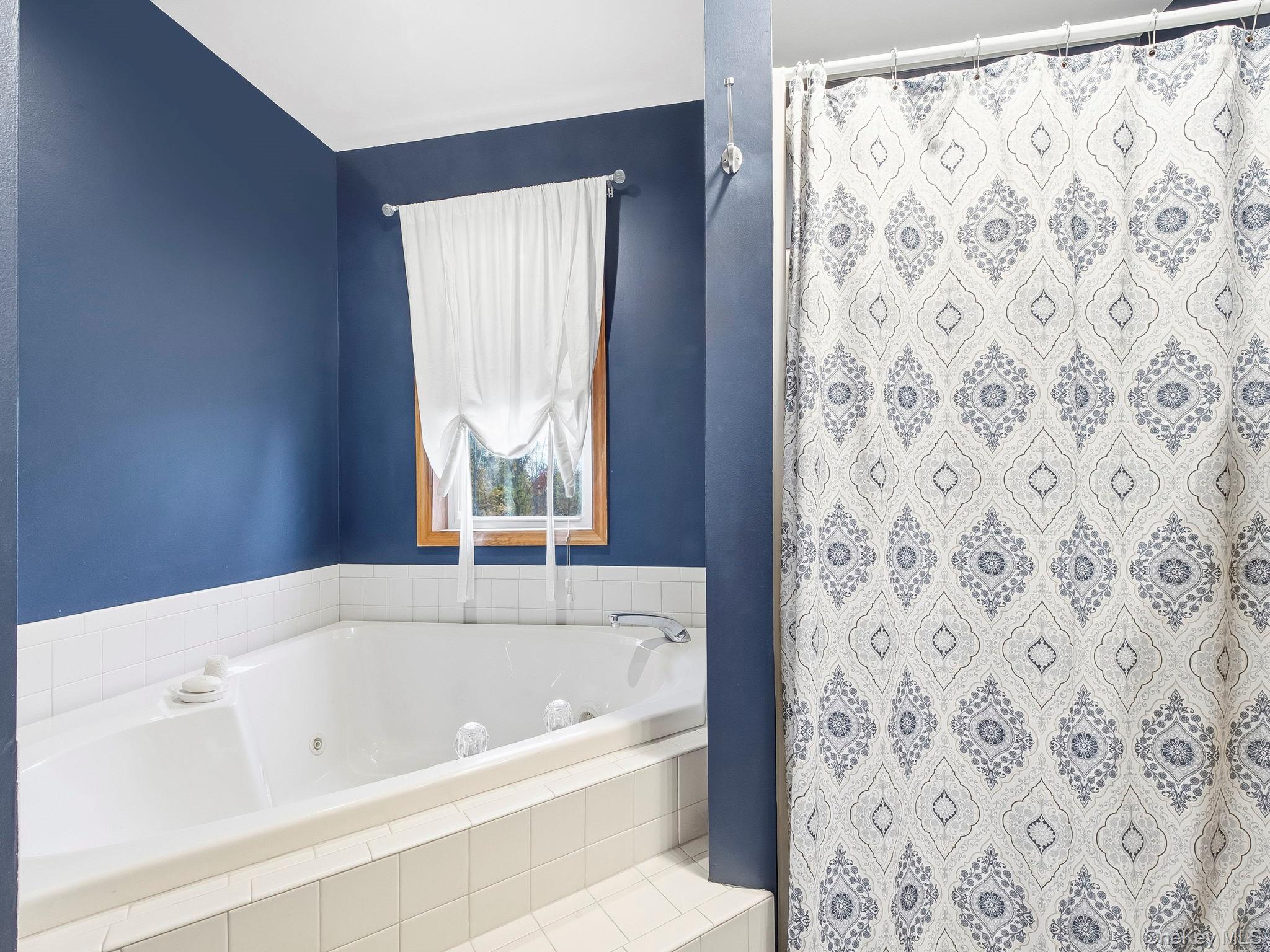 90 Reilly Road LaGrangeville, NY 12540 - Photo 40 of 50 a bathroom with a bathtub and shower