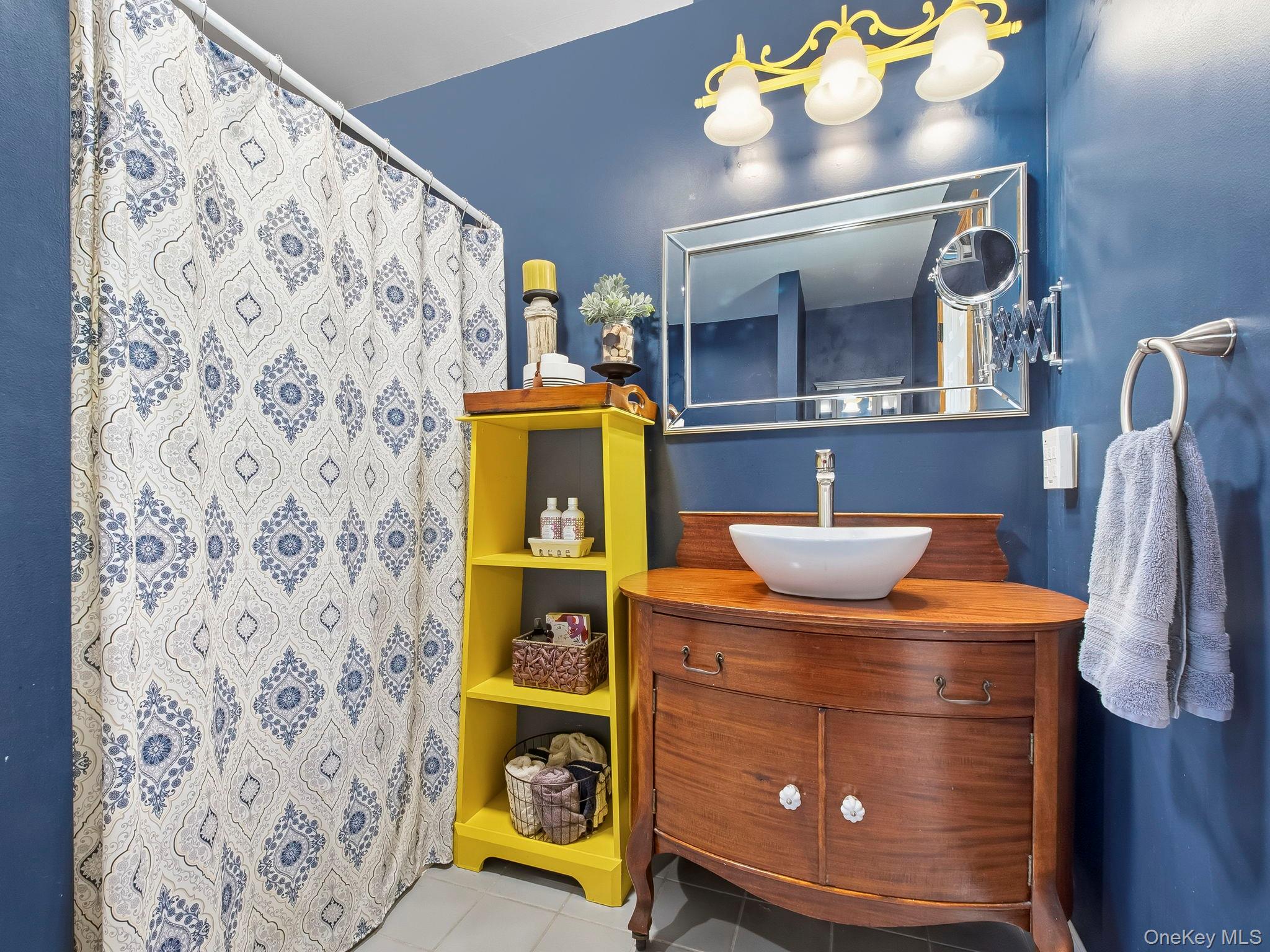 90 Reilly Road LaGrangeville, NY 12540 - Photo 41 of 50 a bathroom with a sink and a mirror