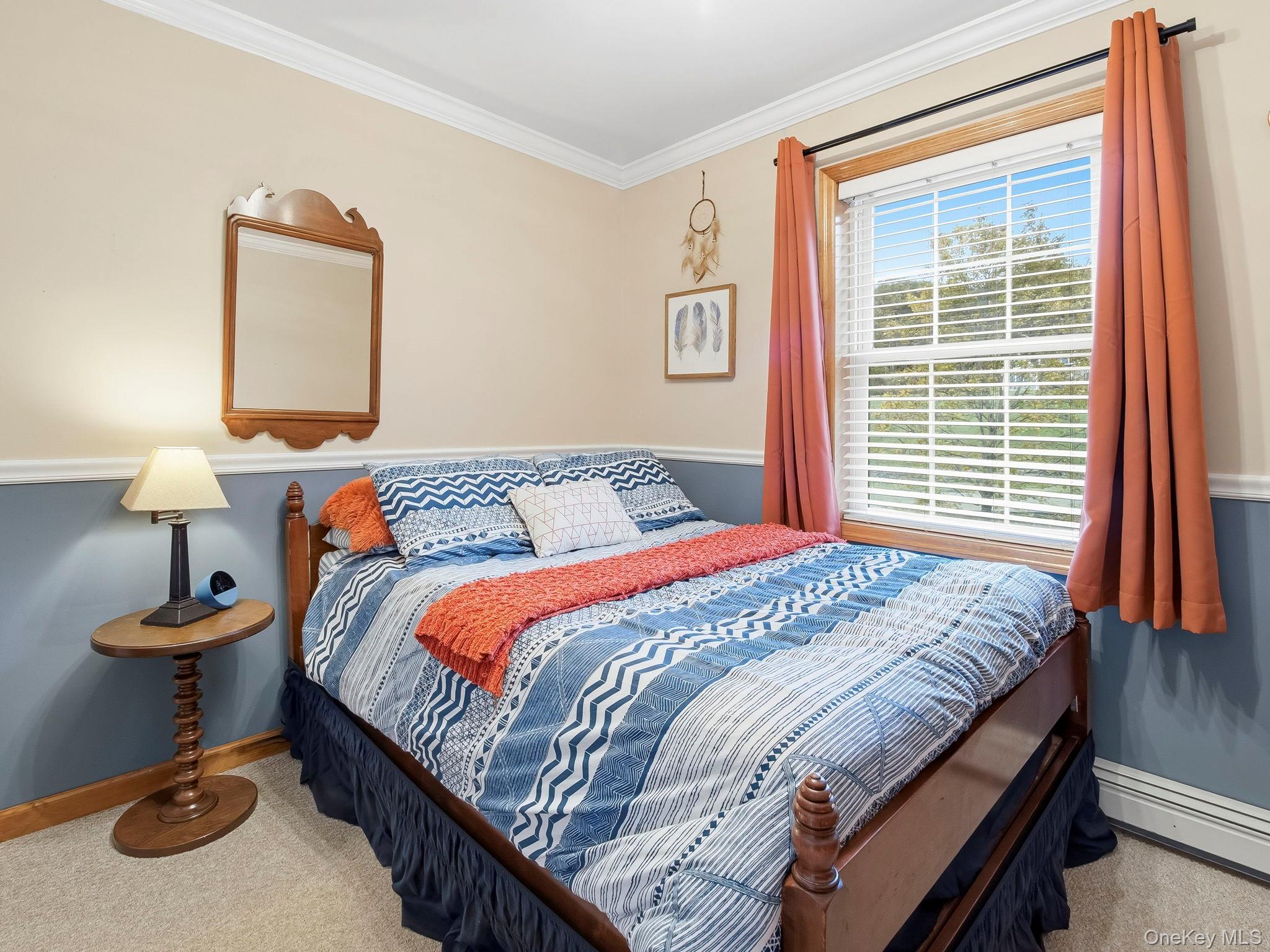 90 Reilly Road LaGrangeville, NY 12540 - Photo 42 of 50 a bedroom with a bed and a window