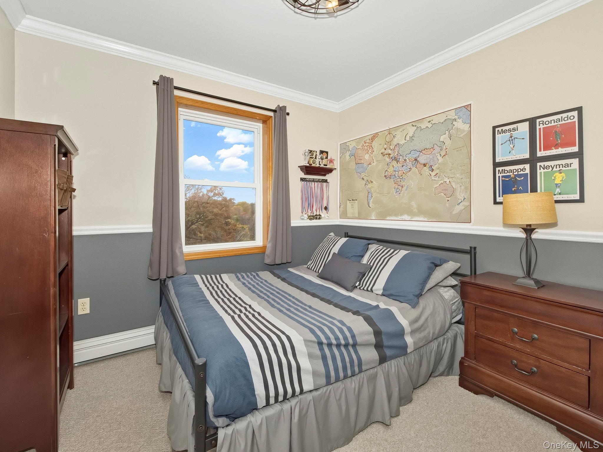 90 Reilly Road LaGrangeville, NY 12540 - Photo 45 of 50 a bedroom with a bed and wooden floor