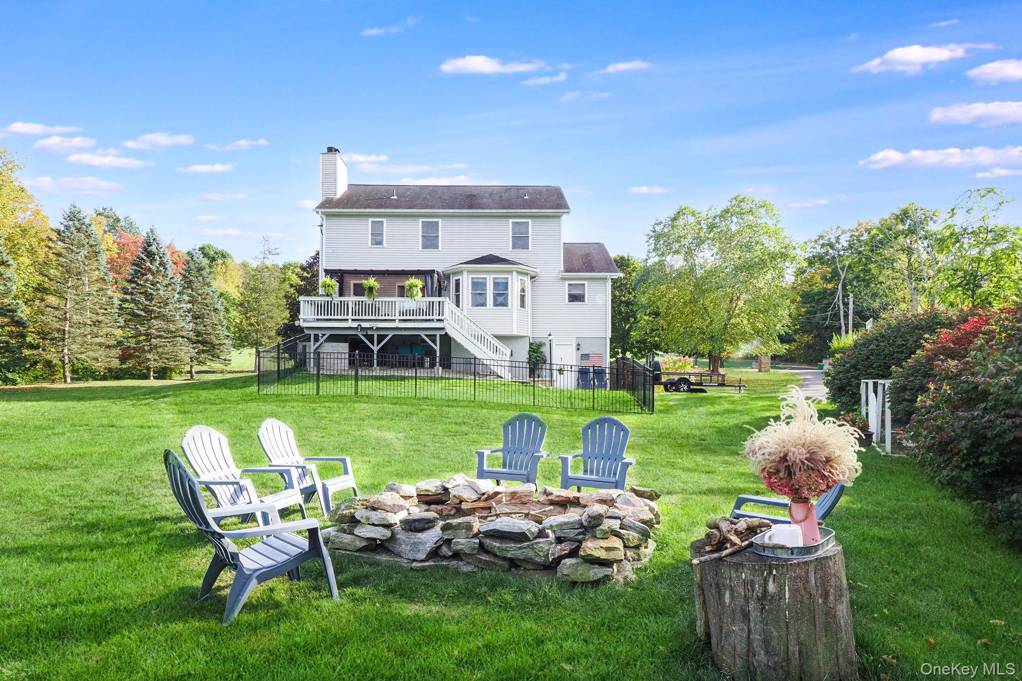 90 Reilly Road LaGrangeville, NY 12540 - Photo 5 of 50 a front view of a house with garden