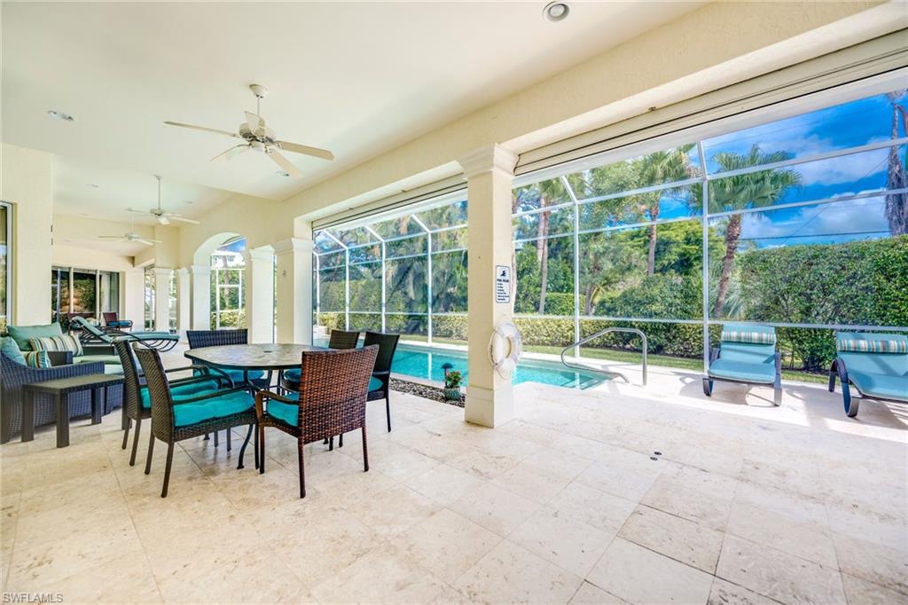 1160 Oleander Drive Naples, FL 34102 - Photo 27 of 31 a view of a dining area with furniture window and outside view