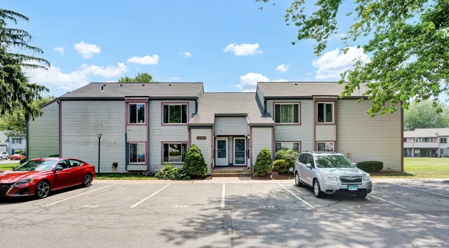 a car parked in front of a house