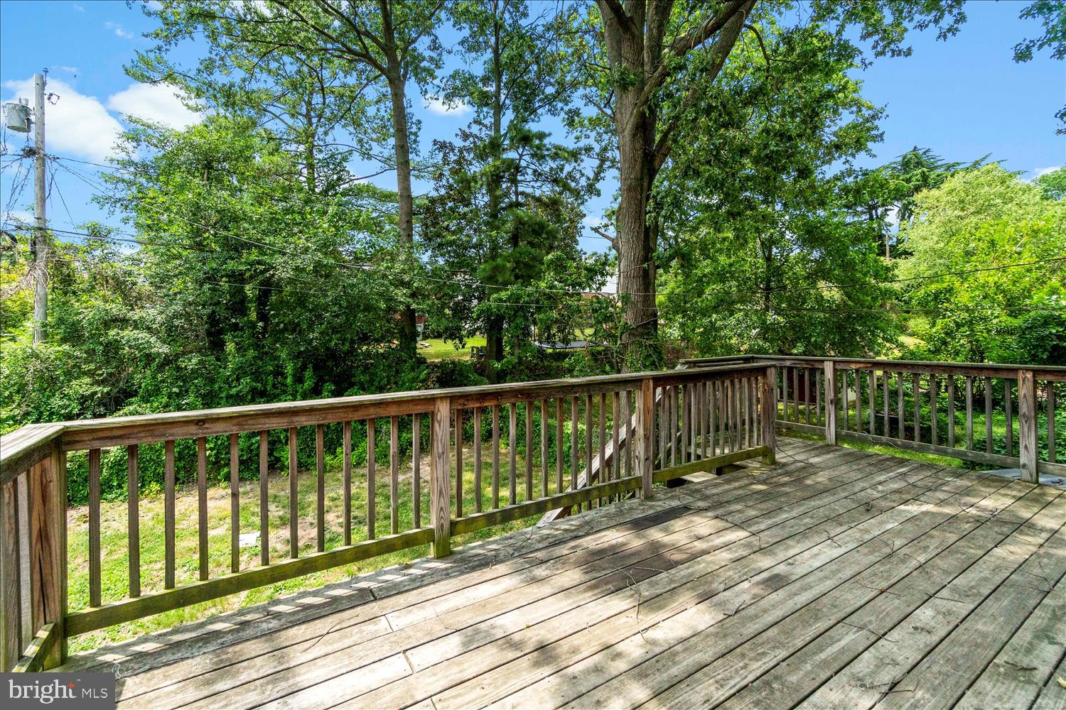 1235 Seven Oaks Road Baltimore, MD 21227 - Photo 24 of 27 Enjoy a Cup of Coffee on Your Girth of a Deck