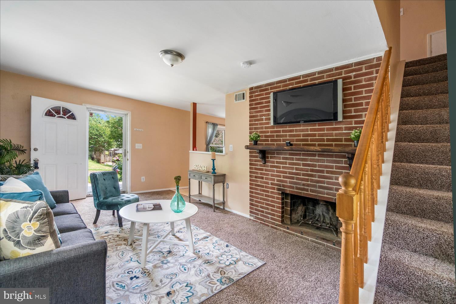 1235 Seven Oaks Road Baltimore, MD 21227 - Photo 9 of 27 Cozy Up in Front of the Fireplace