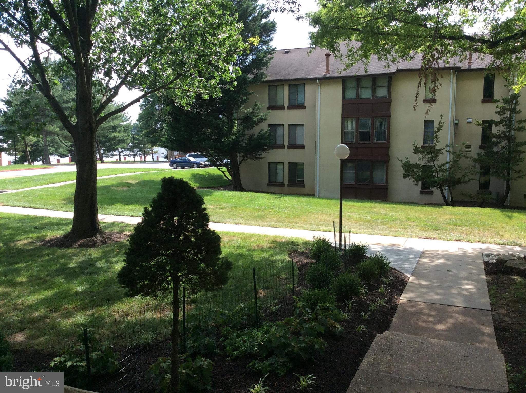 9633 White Acre Road, Unit A2 Columbia, MD 21045 - Photo 5 of 27 a view of a garden