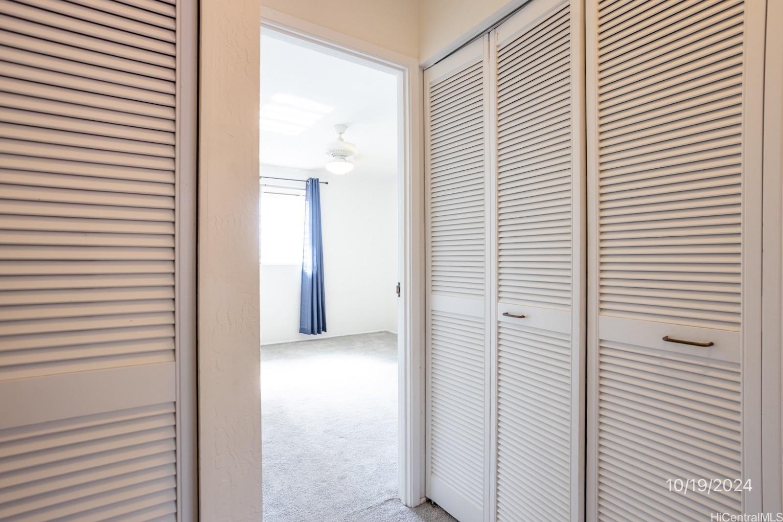 94-112 Anania Drive, Unit 219 Mililani, HI 96789 - Photo 21 of 25 a view of a bathroom with a door