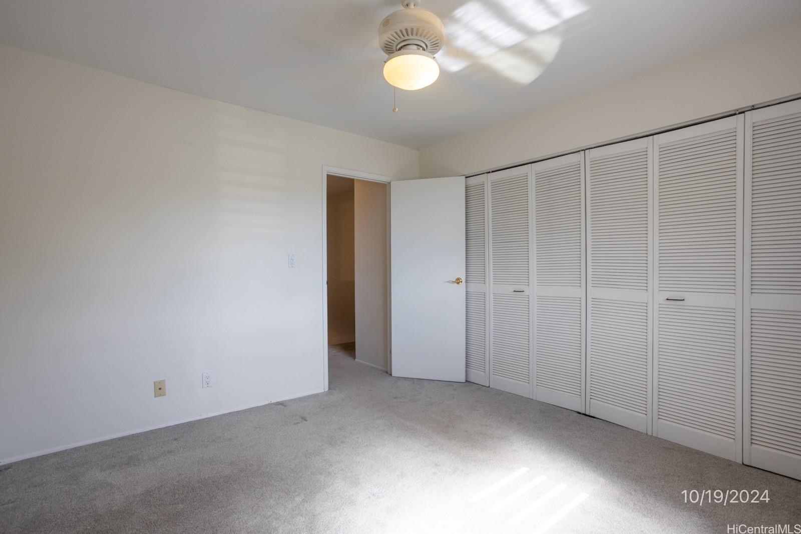 94-112 Anania Drive, Unit 219 Mililani, HI 96789 - Photo 23 of 25 a view of an empty room with a window