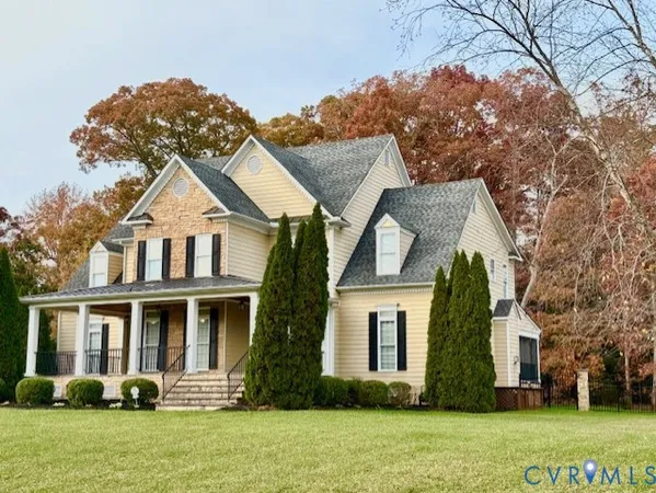 front view of a house with a yard