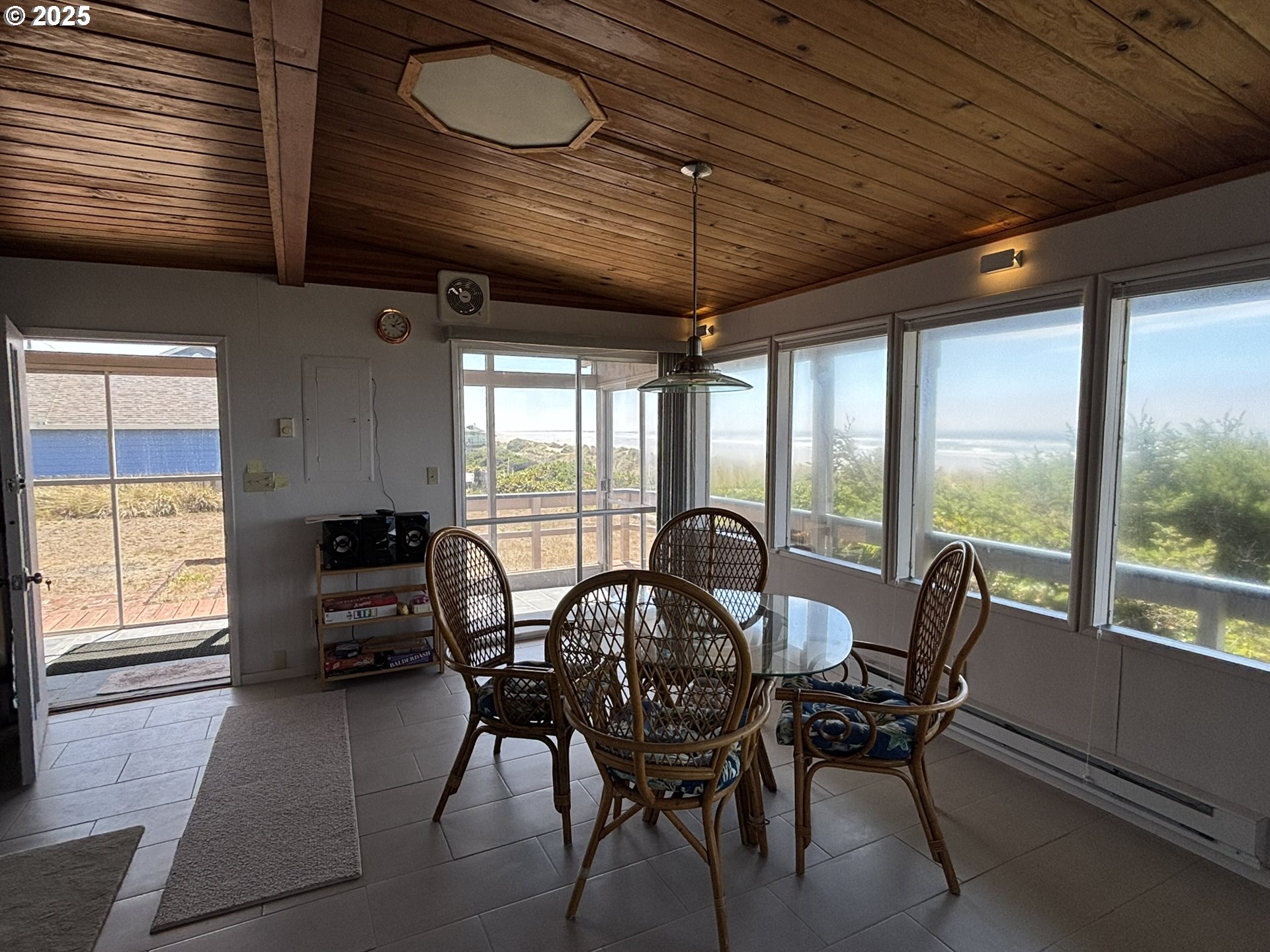 88632 3rd Avenue Florence, OR 97439 - Photo 17 of 43 a view of a dining room with furniture window and outside view