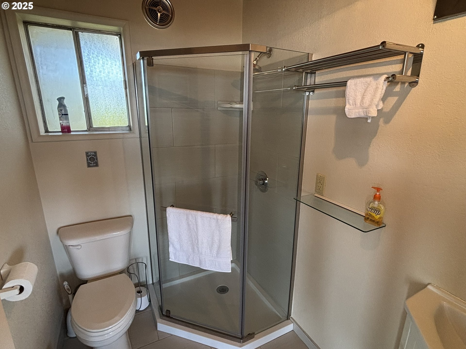 88632 3rd Avenue Florence, OR 97439 - Photo 30 of 43 a bathroom with a shower and toilet