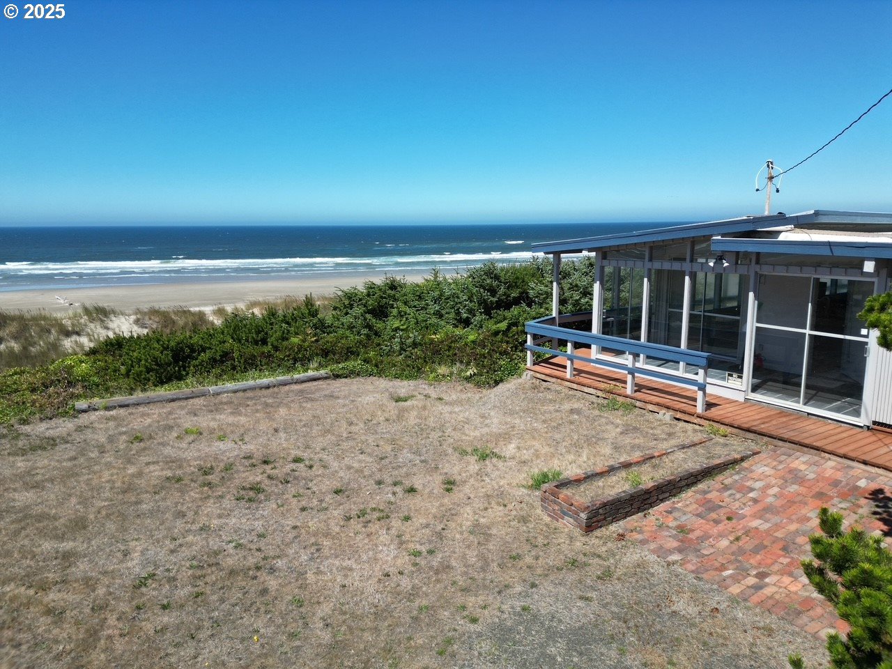 88632 3rd Avenue Florence, OR 97439 - Photo 3 of 43 a view of a swimming pool with an outdoor seating and a window
