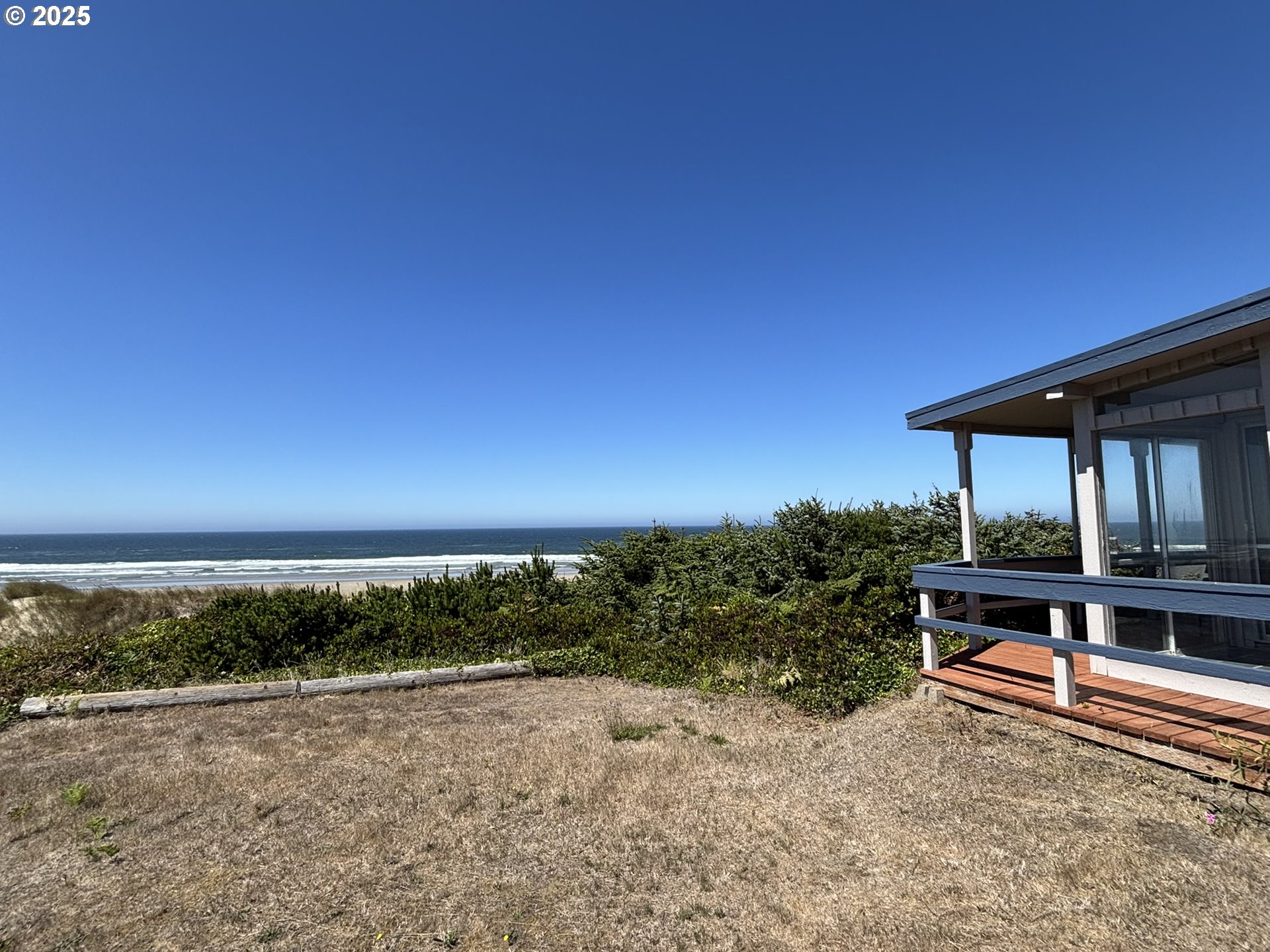 88632 3rd Avenue Florence, OR 97439 - Photo 43 of 43 a view of a terrace with a bench
