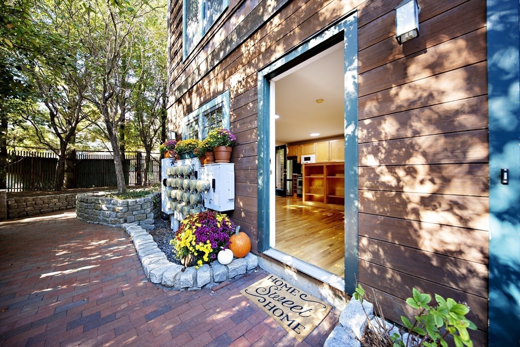 411 Norfolk Street, Unit 1F Somerville, MA 02143 - Photo 12 of 16 a view of a interior of the house with a yard