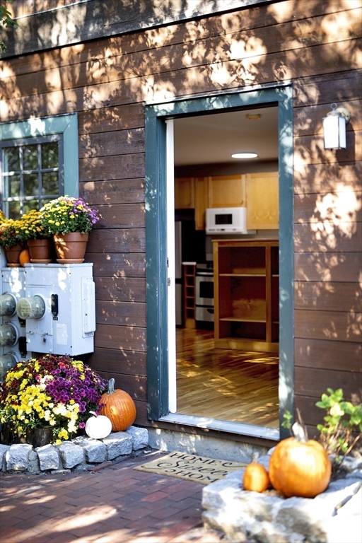 411 Norfolk Street, Unit 1F Somerville, MA 02143 - Photo 13 of 16 a view of a room with front door