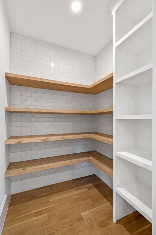 81 Sagamore Street Hamilton, MA 01982 - Photo 13 of 37 a view of walk in closet with empty racks