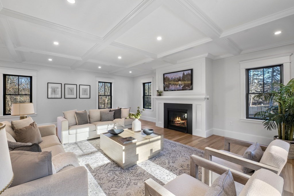 81 Sagamore Street Hamilton, MA 01982 - Photo 14 of 37 a living room with furniture and a fireplace