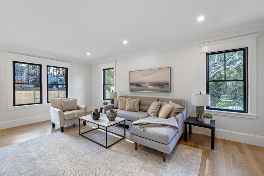 81 Sagamore Street Hamilton, MA 01982 - Photo 17 of 37 a living room with furniture and a window