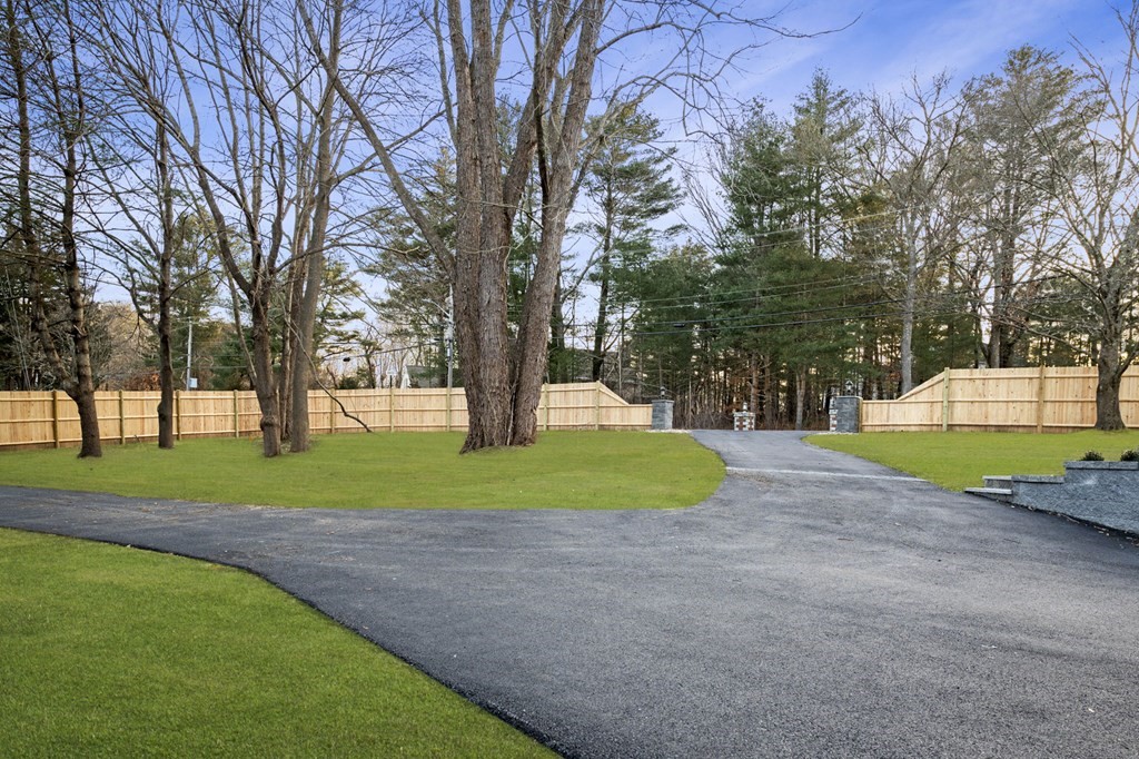 81 Sagamore Street Hamilton, MA 01982 - Photo 3 of 37 a view of a park with large trees