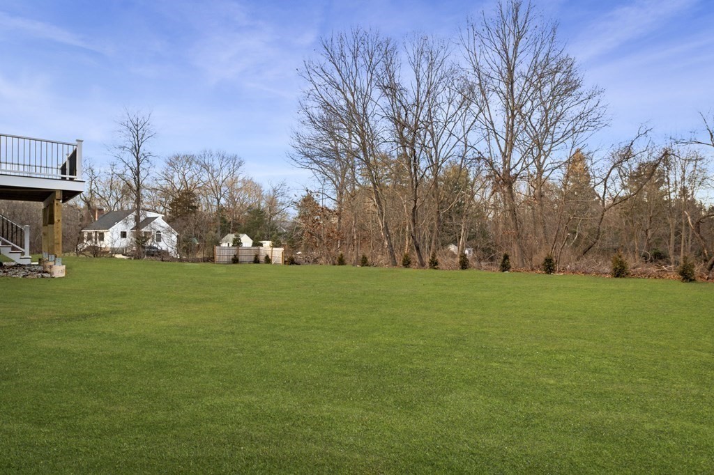 81 Sagamore Street Hamilton, MA 01982 - Photo 35 of 37 a view of field with tall trees