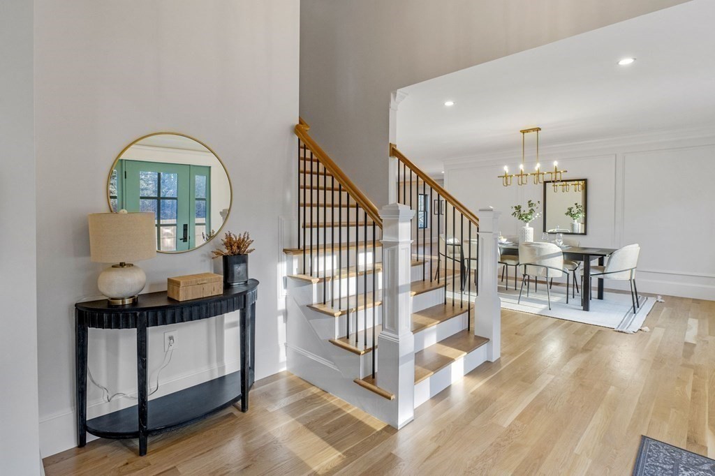 81 Sagamore Street Hamilton, MA 01982 - Photo 6 of 37 a bedroom with furniture and a wooden floor