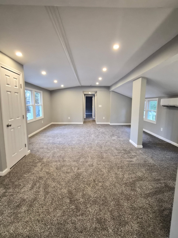 7 David Carver, MA 02330 - Photo 11 of 22 a view of an empty room with window and chandelier