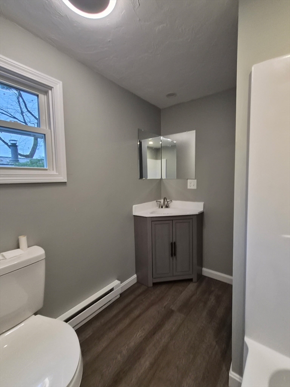 7 David Carver, MA 02330 - Photo 5 of 22 a bathroom with a toilet sink and mirror