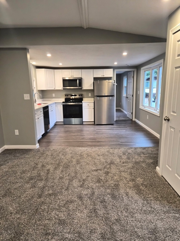 7 David Carver, MA 02330 - Photo 7 of 22 a kitchen with stainless steel appliances granite countertop a refrigerator and a stove top oven