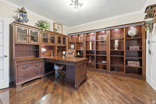 2342 Charros Road Sandy, UT 84092 - Photo 10 of 94 Dedicated room featuring extensive built-in wooden shelving, a built-in wooden desk unit, wood-finish flooring, crown molding, and recessed lighting