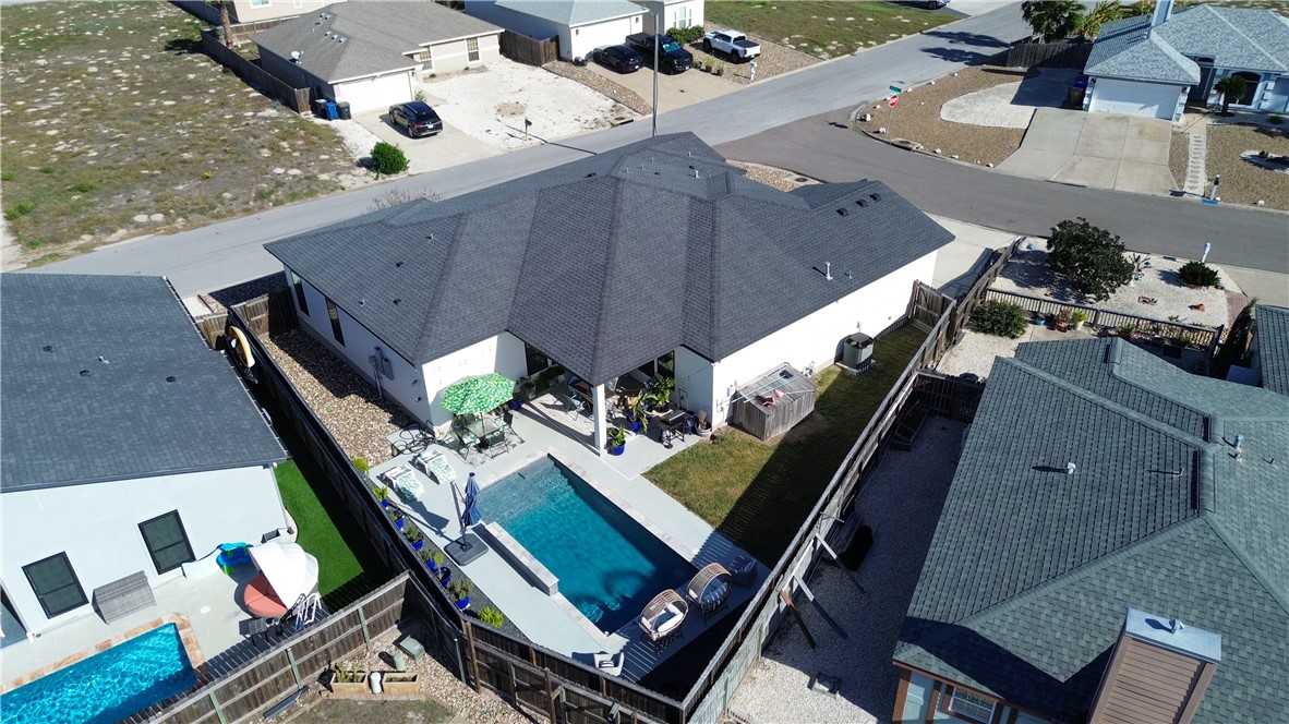 16101 Jessamine Street Corpus Christi, TX 78418 - Photo 1 of 28 an aerial view of house with pool