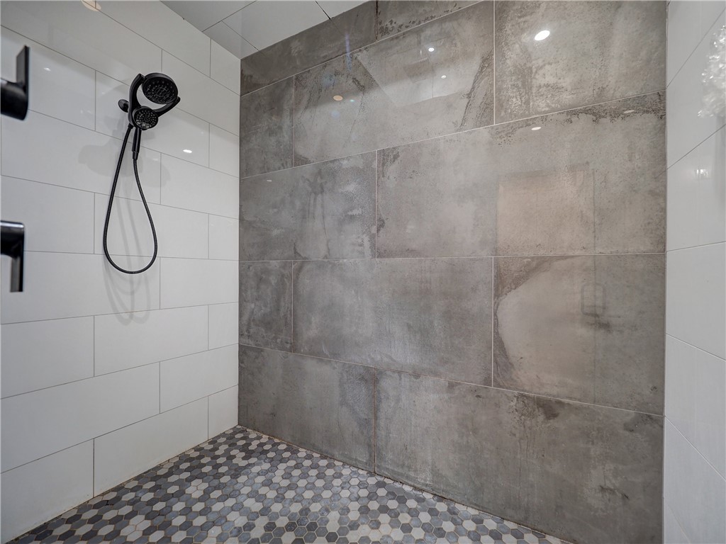 16101 Jessamine Street Corpus Christi, TX 78418 - Photo 18 of 28 a bathroom with a shower