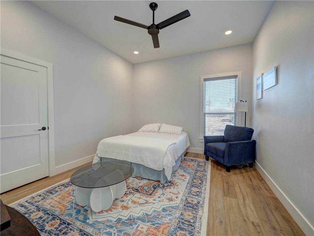 16101 Jessamine Street Corpus Christi, TX 78418 - Photo 20 of 28 a living room with a couch and a rug