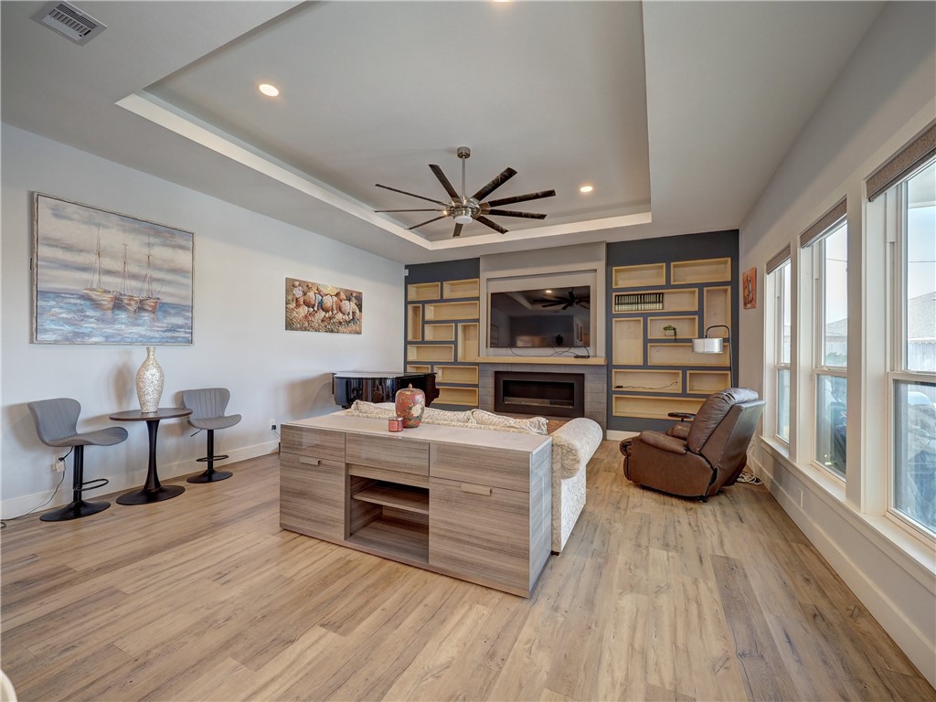 16101 Jessamine Street Corpus Christi, TX 78418 - Photo 5 of 28 a living room with furniture and a flat screen tv
