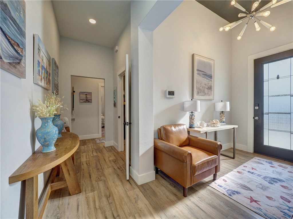 16101 Jessamine Street Corpus Christi, TX 78418 - Photo 10 of 29 a living room with furniture and a table