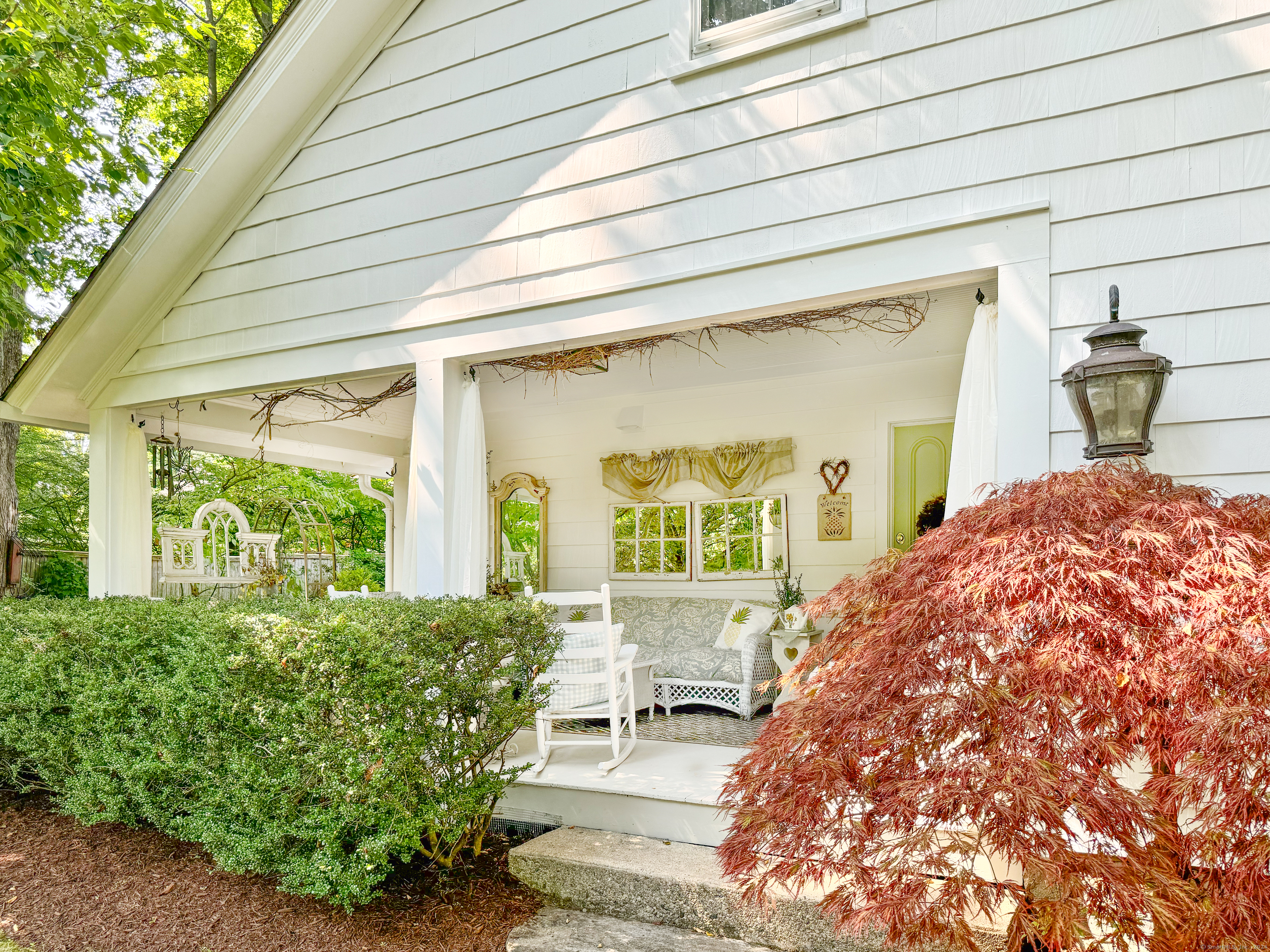 414 Riverside Avenue Westport, CT 06880 - Photo 27 of 40 a front view of a house with garden