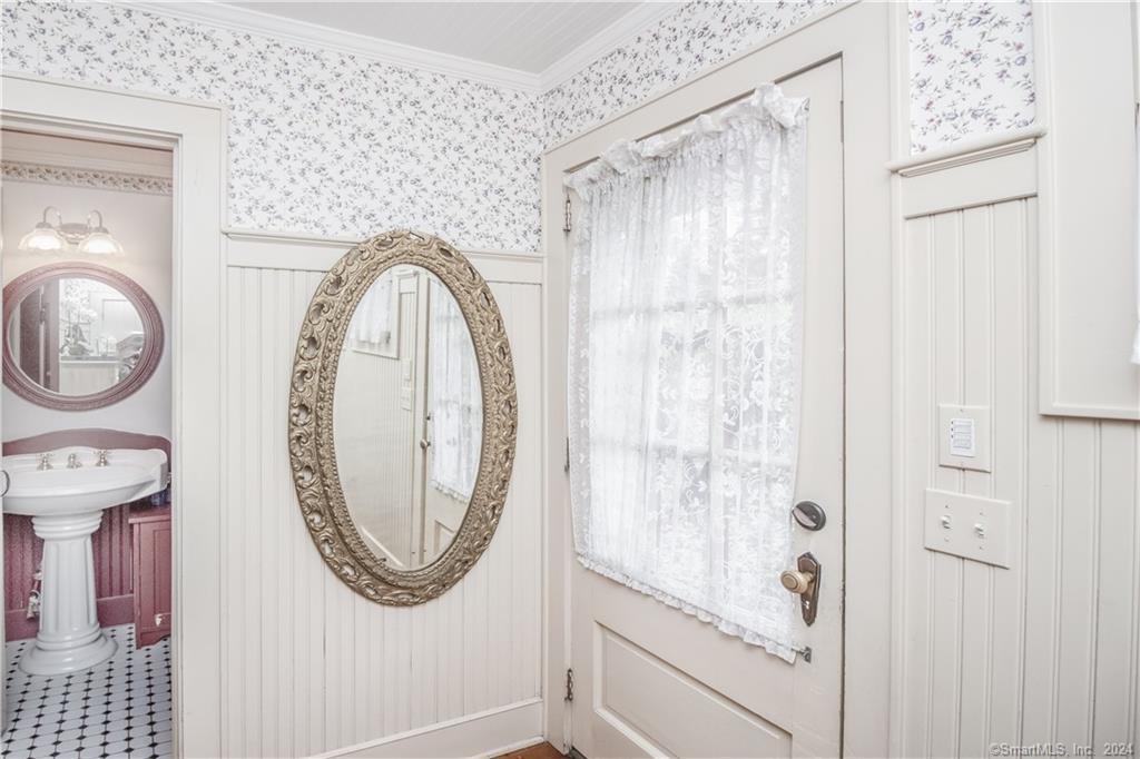414 Riverside Avenue Westport, CT 06880 - Photo 4 of 40 a bathroom with a mirror and a shower